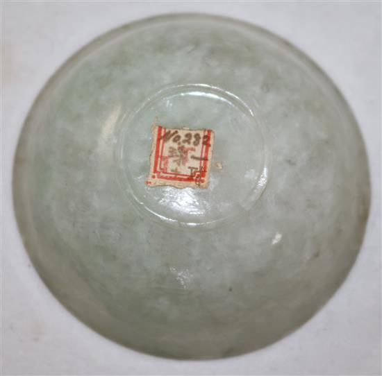 A pair of Chinese ice white and pale green jadeite bowls, early 20th century, diameter 7cm